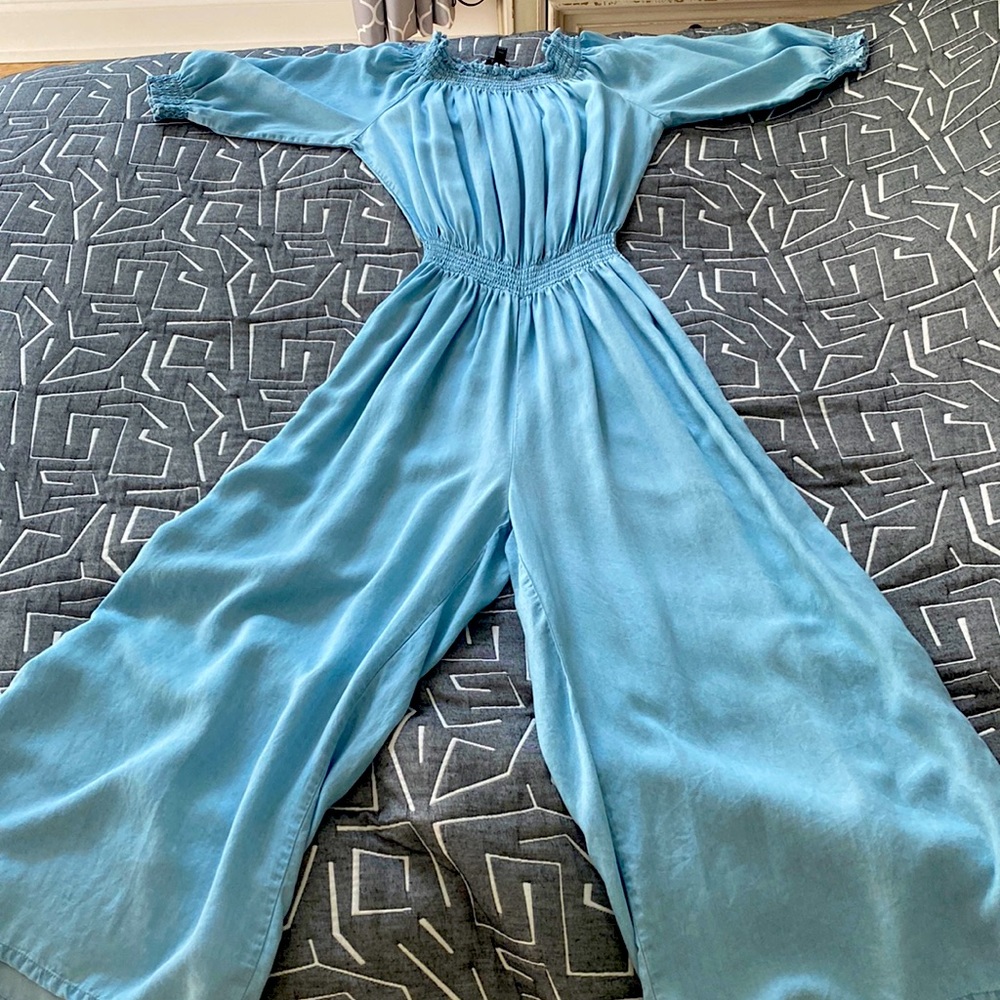 A bright blue walter baker romper.
